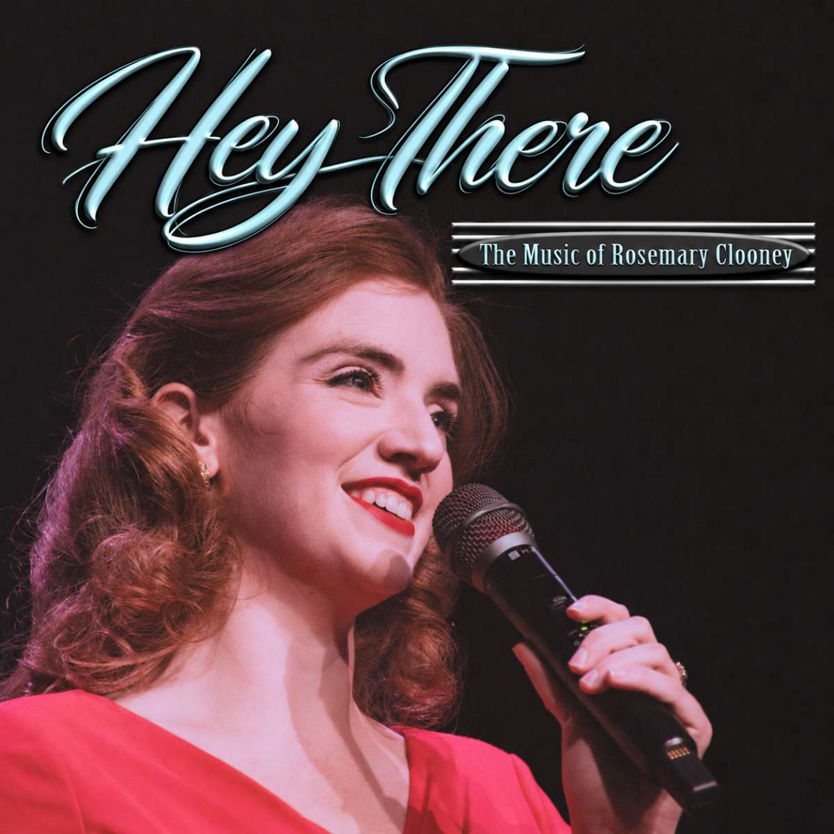 A woman in a red dress sings into a microphone, with text above reading Hey There: The Music of Rosemary Clooney.